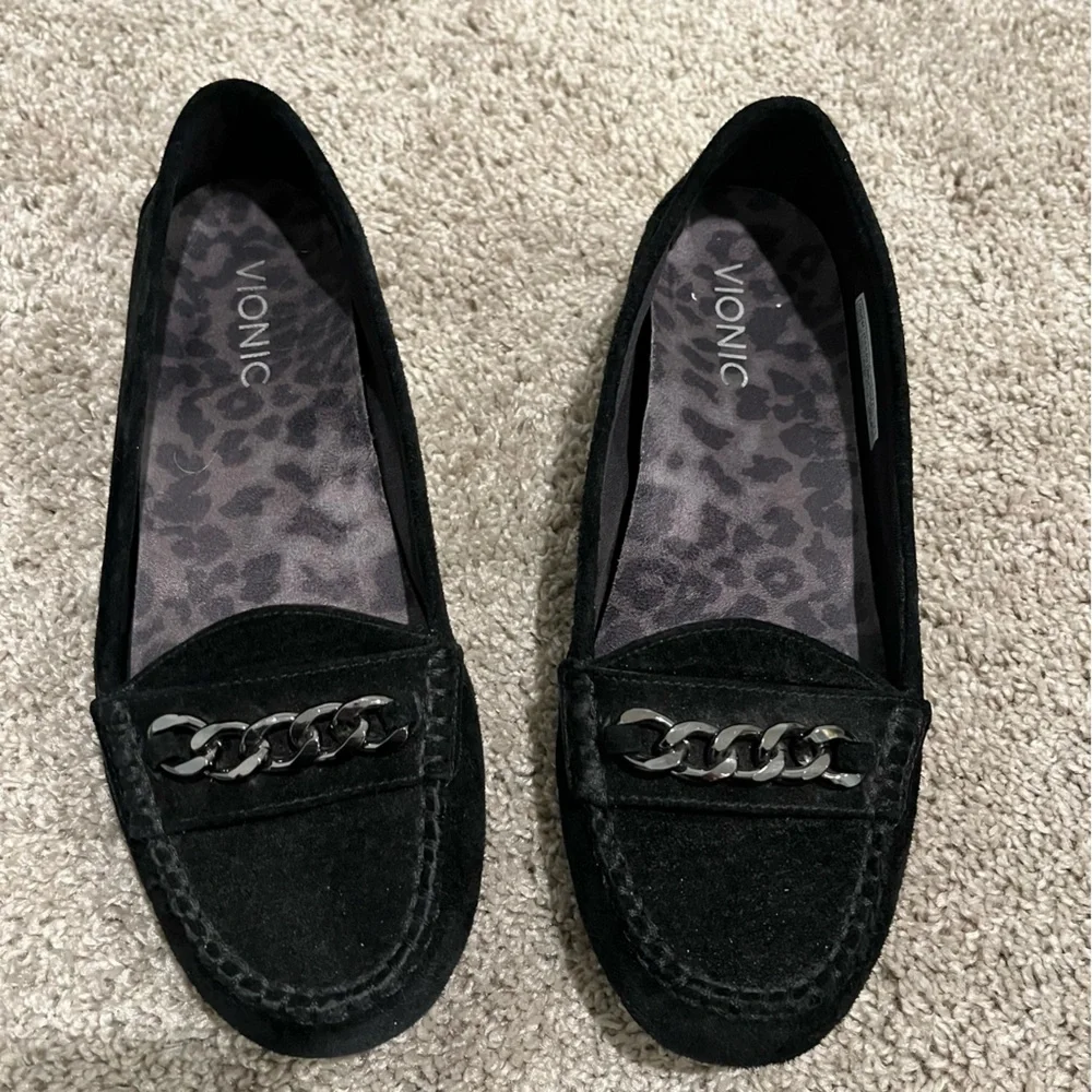 Vionic black suede Mesa loafers with gunmetal/muted silver chain accent